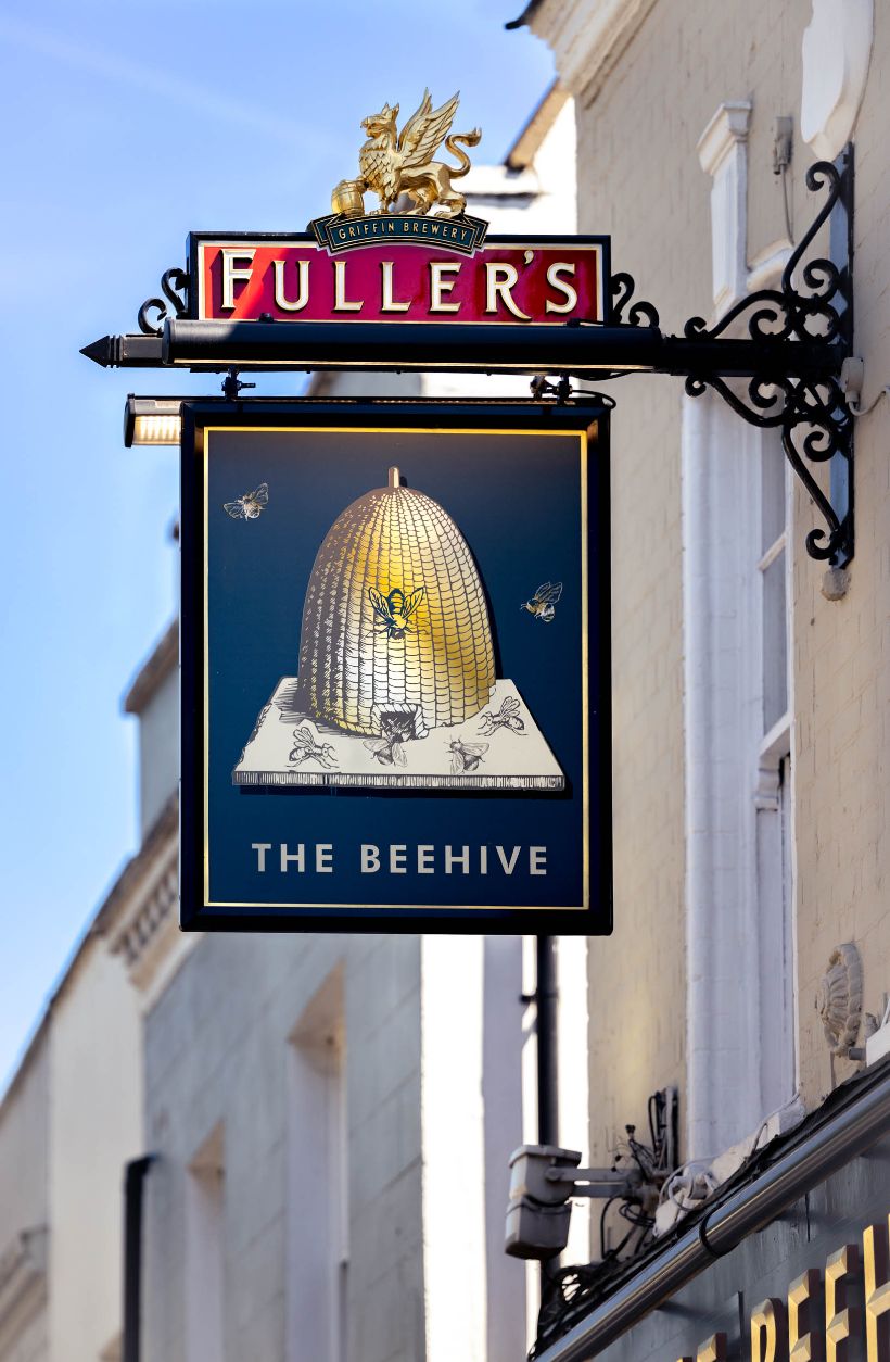 Fuller's the Beehive swing sign