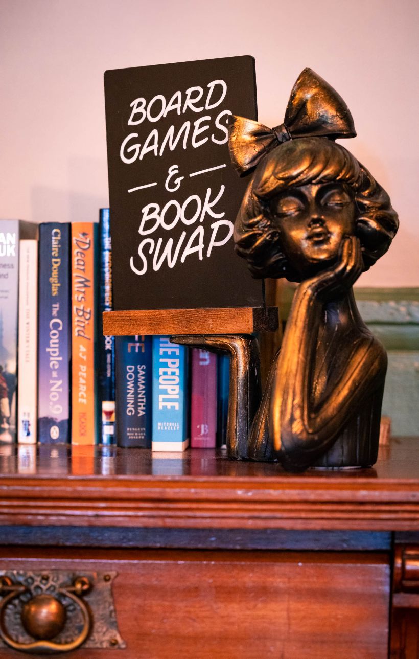 Board games and book swap sign